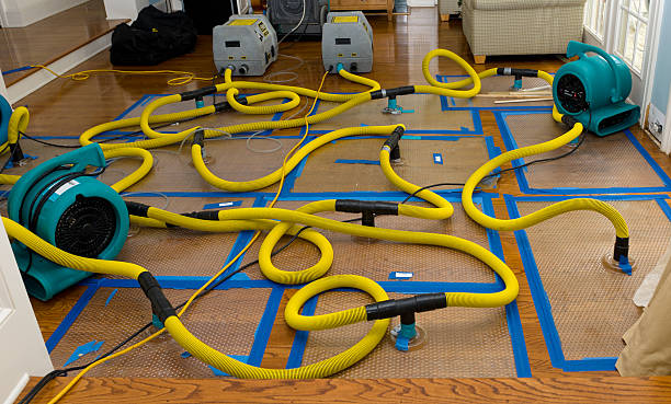 Professional Flood Damage Restoration technician working in Hannibal, OH